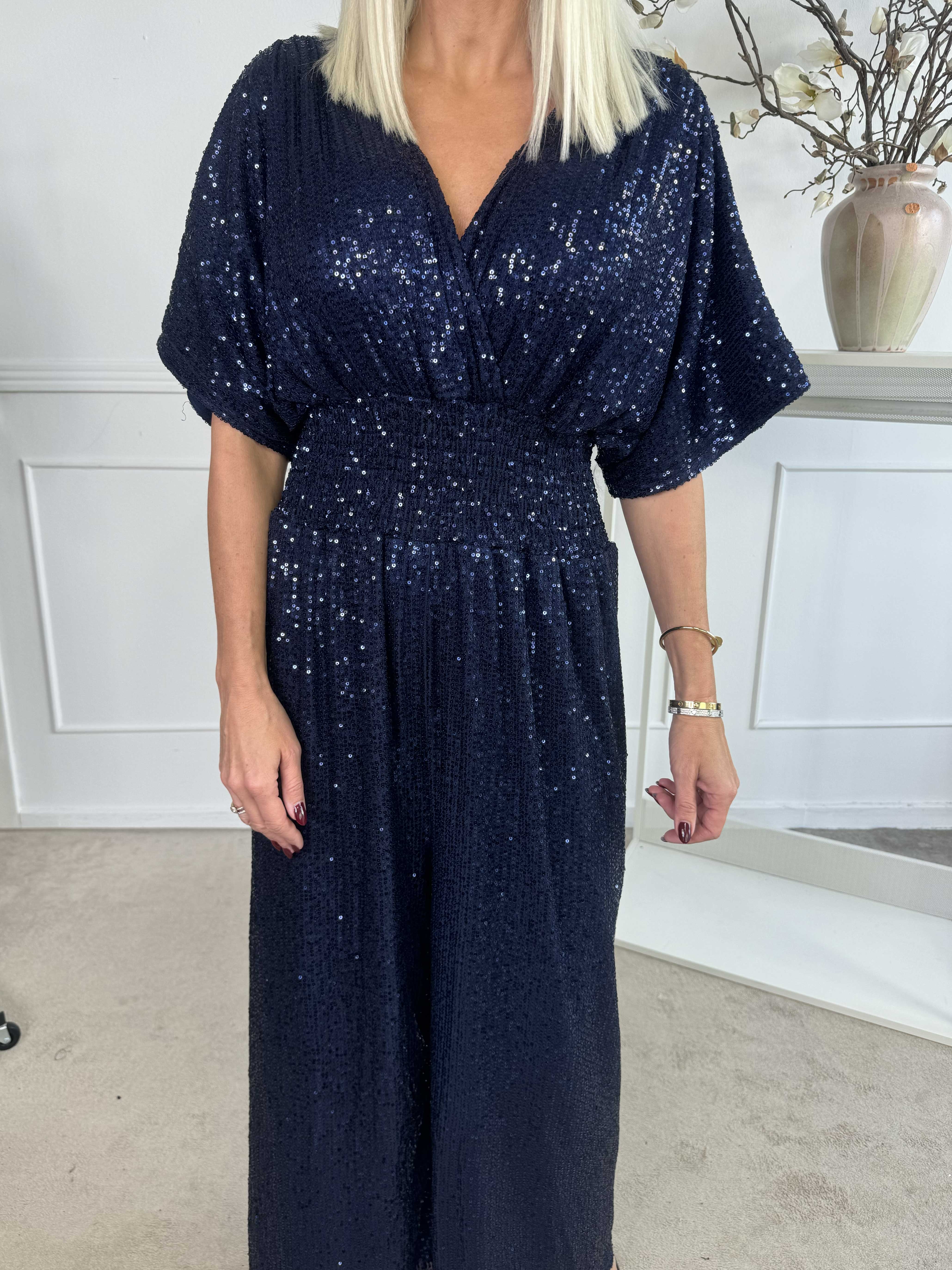 Pams Glitter Jumpsuit - Elastisk jumpsuit med smock och paljetter